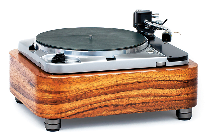 في طراز Thorens TD124 الذي استلهمته شركة وودسونغ أوديو من مشغل أسطوانات دوار عتيق الطراز، يُستخدم ترس وسيط لدفع السطح الدوار.