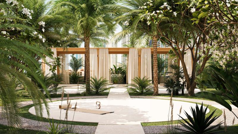 منصة لتمارين اليوغا تحتجب في خفاء الحدائق الخارجية.